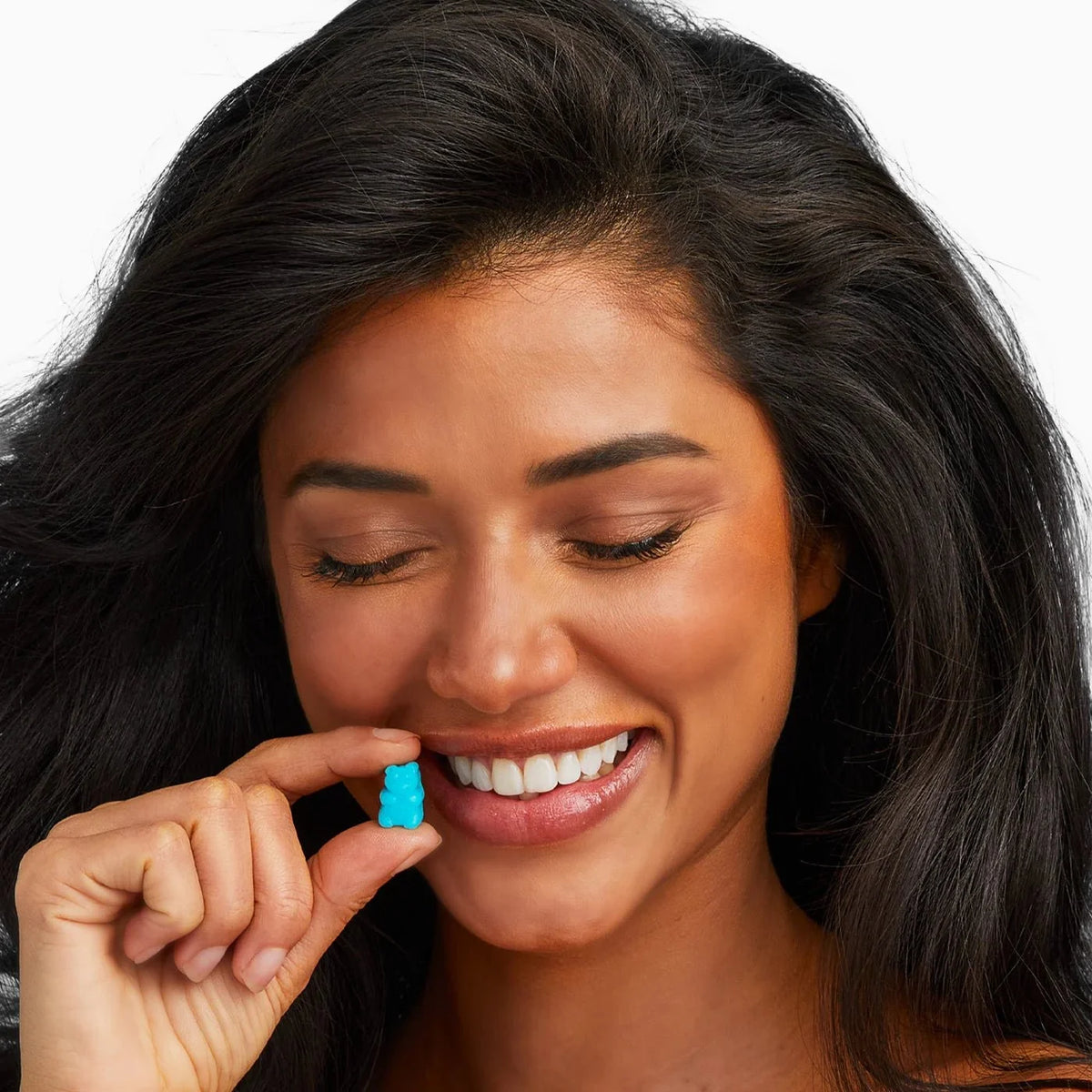 SugarbearPRO® Hair Vegan Vitamin Gummies - Woman holding vegan hair vitamins